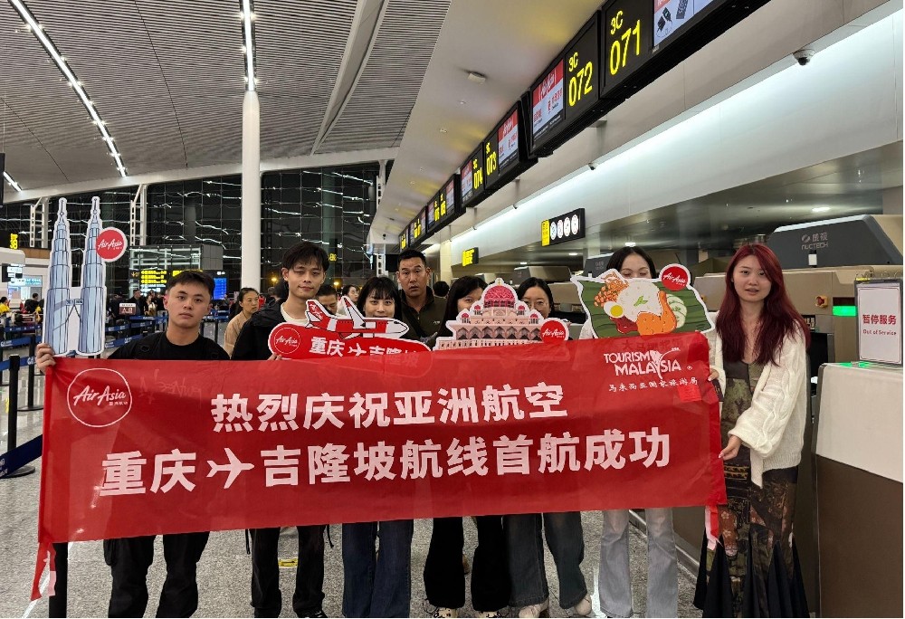 亚洲航空重庆-吉隆坡航线顺利首航628114 亚洲航空重庆-吉隆坡航线顺利首航